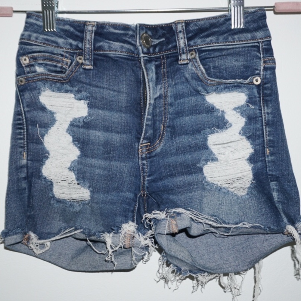 American Eagle Blue Denim high-rise Next Level Stretch ripped shorts. Size 0.